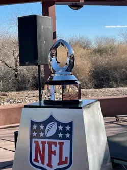 A beautiful NFL award on display for an event